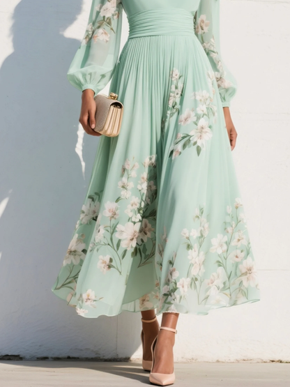 Monroe | Chiffon midi-jurk met V-hals en bloemenprint